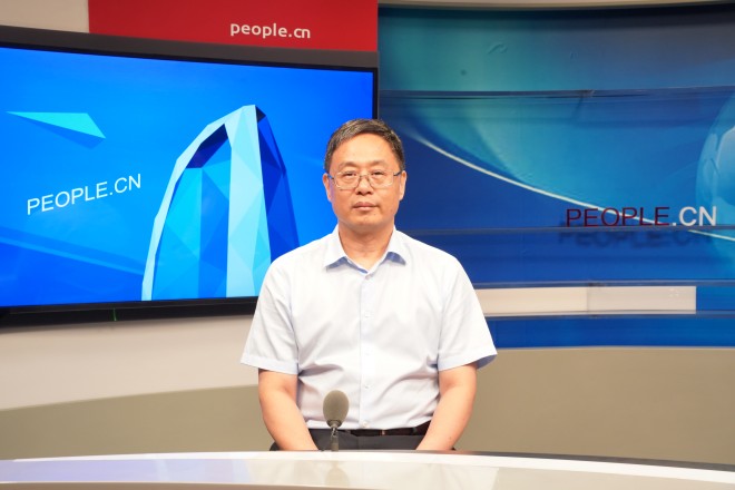 中國藝術研究院院長、黨委副書記周慶富做客人民網。張力洋攝